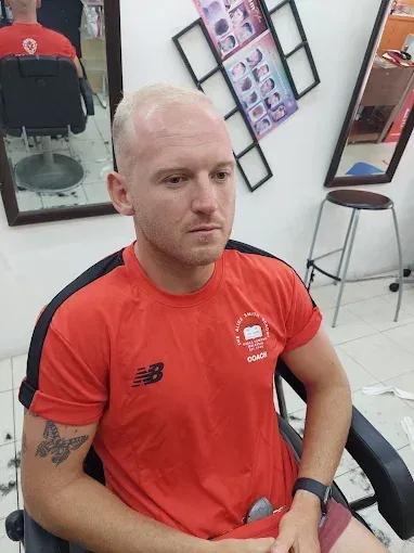 Customer with a fresh buzz cut