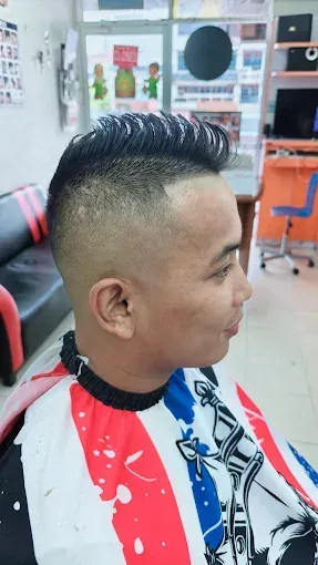 Comb over with a skin fade