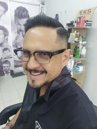 Smiling customer with a fresh textured cut