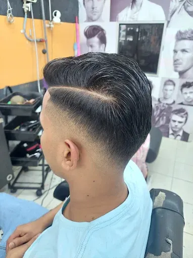 Hard part comb over with a fade