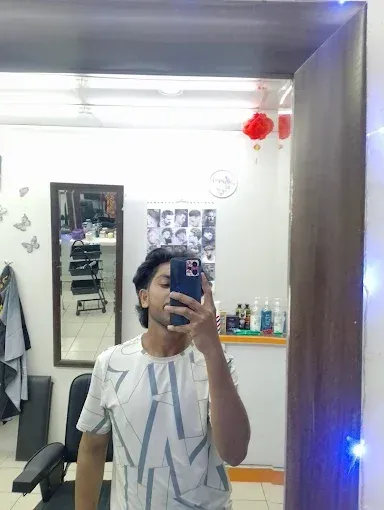 Customer's mirror selfie by the shop mirror