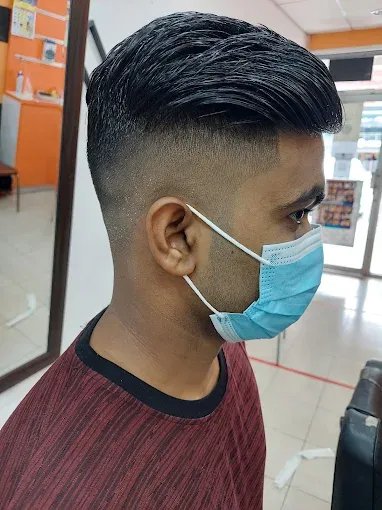 Quiff with a high skin fade
